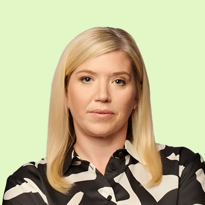 White female business leader looking confident Bridget Beals head shot