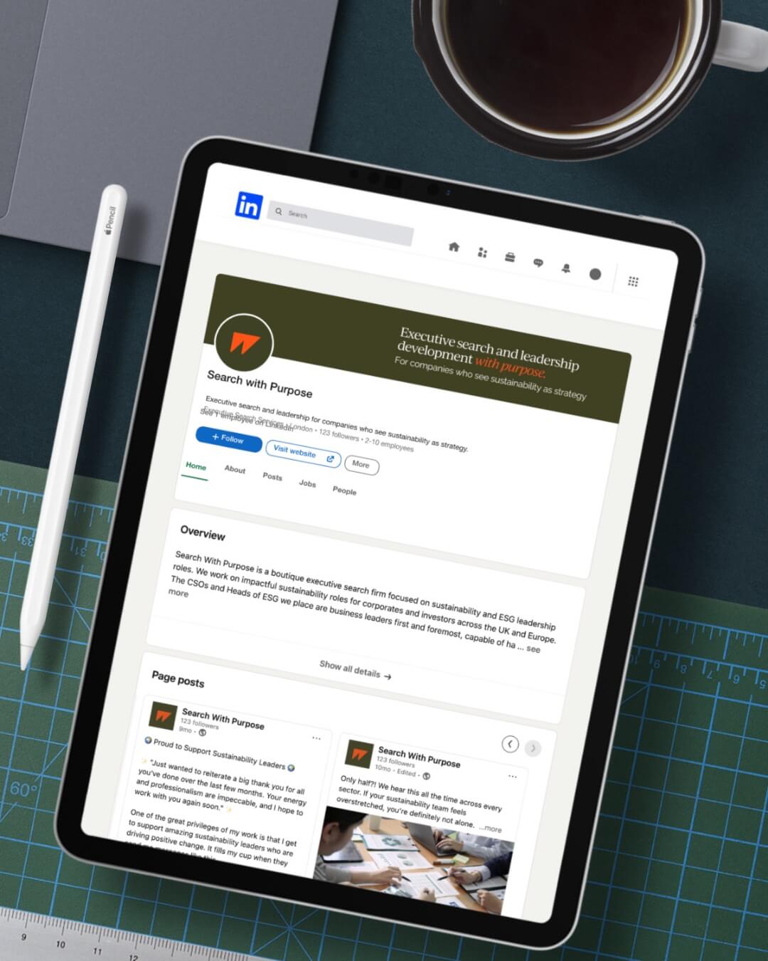 Tablet showing the LinkedIn company page for Search With Purpose, featuring their new brand banner and profile visuals designed by Toartle as part of the full brand system.
